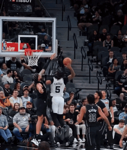 a basketball player with the number 5 on his back