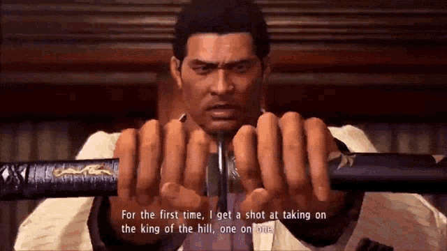 a man is holding a sword and says for the first time i get a shot at taking on the king