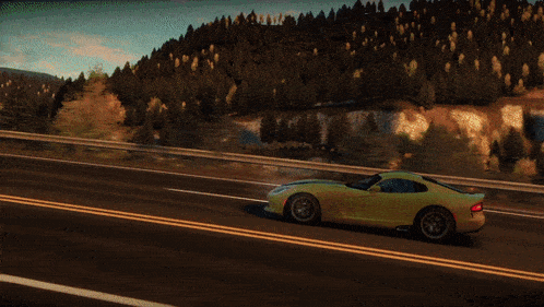 a yellow sports car is driving down a road in front of a carnival tent that says ' fast ' on it