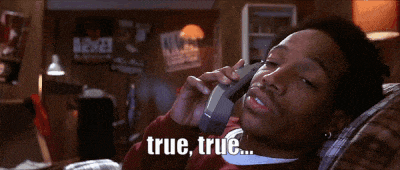 a man is laying on a couch talking on a cell phone with the words true true written on the bottom