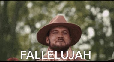 a man with a beard wearing a hat with the words " fallelujah " below him
