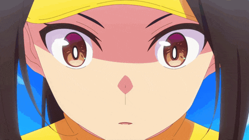 a close up of a cartoon character 's face with a yellow hat