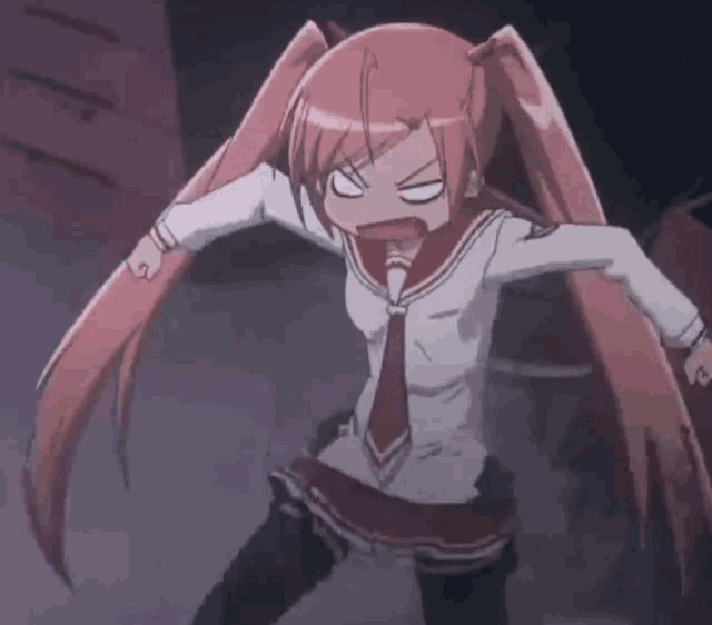 a girl with long red hair is making a face