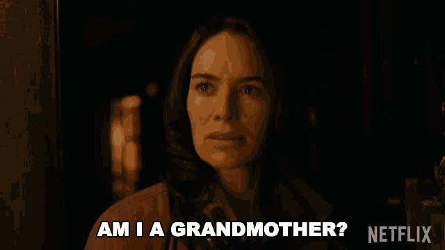 a woman in a dark room says am i a grandmother