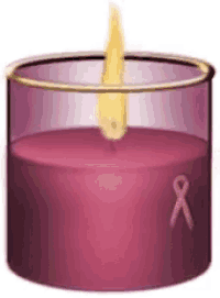 a purple candle in a glass with a pink ribbon on it