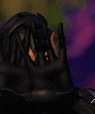 a close up of a cartoon character 's face with black gloves on