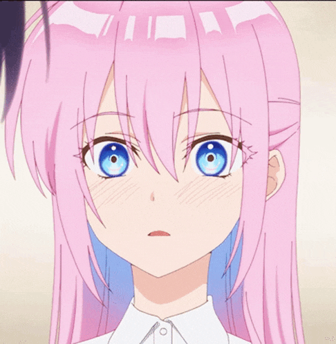 a girl with pink hair and blue eyes is smiling for the camera
