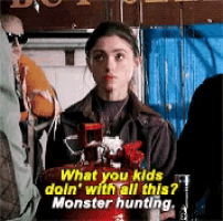 a woman is holding a fire extinguisher and says what you kids doin ' with all this monster hunting .