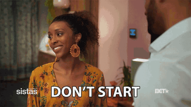 a woman smiles and says " do n't start "