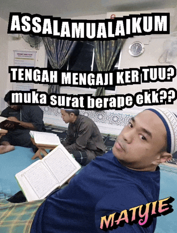 a man sits in a room reading a book with the words assalamualaikum behind him