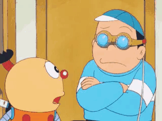 a cartoon character wearing goggles and a blue hat is talking to another character