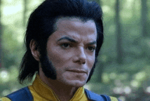 a man with long black hair and a beard is wearing a yellow and blue vest