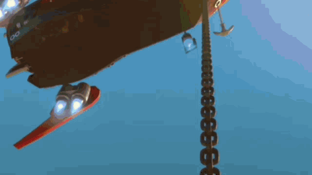 a pirate ship is flying through the air with a rope attached to it