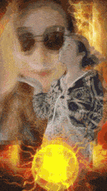a woman wearing sunglasses is surrounded by flames and a yellow ball