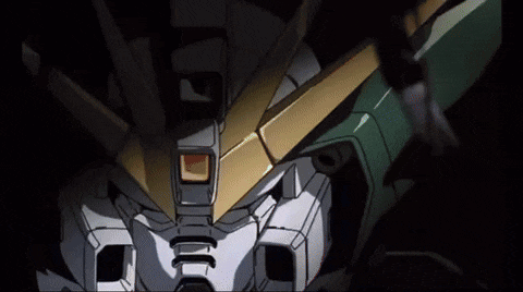 a close up of a robot 's head with a yellow stripe on the top