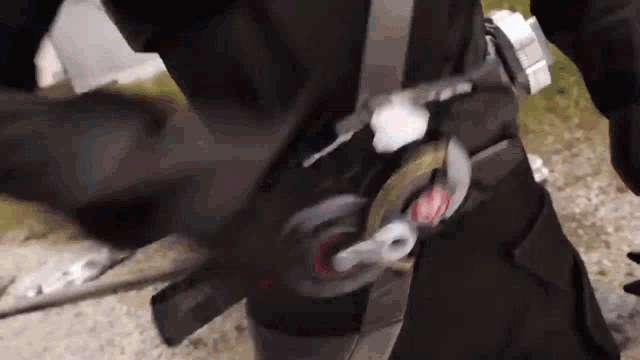 a close up of a person 's waist with a belt on it