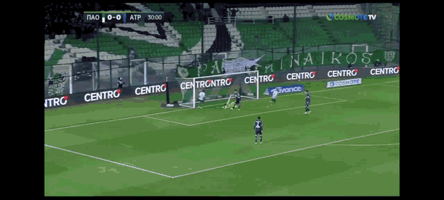 a soccer game is being played in a stadium with advertisements for centro