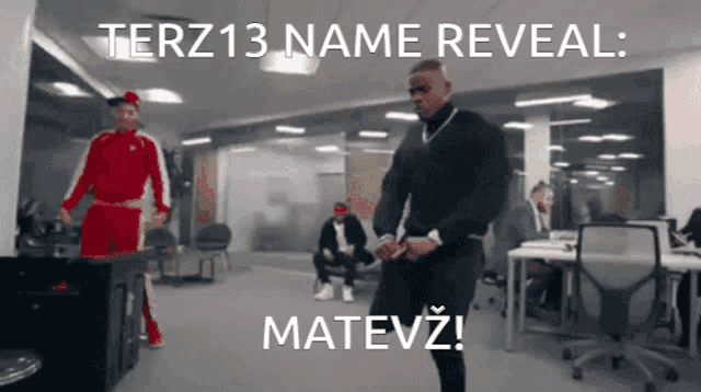 a man dancing in an office with the words terz13 name reveal
