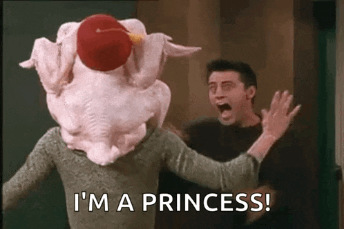 a man is standing next to a woman wearing a turkey head and says `` i 'm a princess ! ''