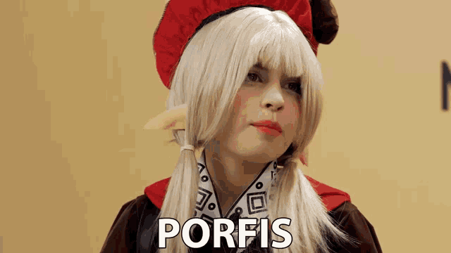 a woman in a costume with the word porfis written on the bottom