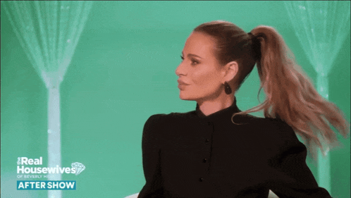 a woman with a ponytail is on a television show called real housewives