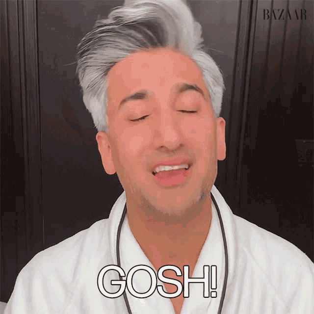 a man in a white robe says gosh in front of a harper 's bazaar logo