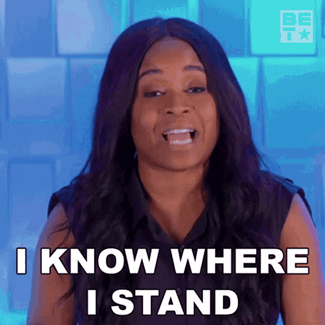 a woman says " i know where i stand " with her mouth open