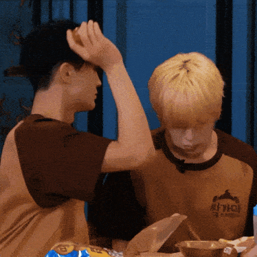 a man wearing a shirt that says ' seoul ' on the back