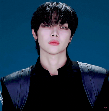 a close up of a person 's face with the letter p on the bottom right