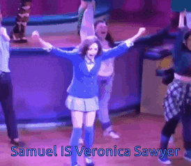 samuel is veronica sawyer is dancing on stage with a group of people