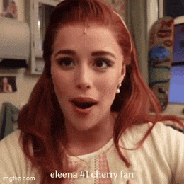 a woman with red hair has a surprised look on her face and the words " eleena # 1 cherry fan " are below her