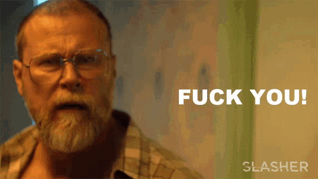 a man with glasses and a beard says " fuck you " in white