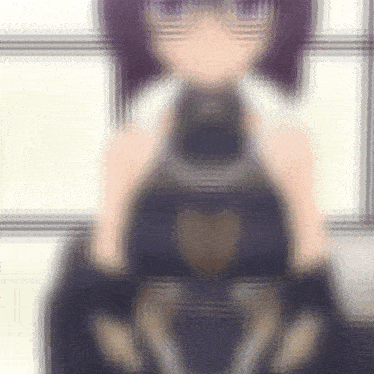 a blurry picture of a girl wearing glasses