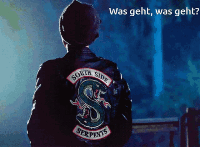 a person wearing a jacket that says south side serpents on the back