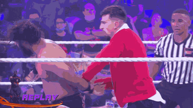 a replay of a wrestling match is shown