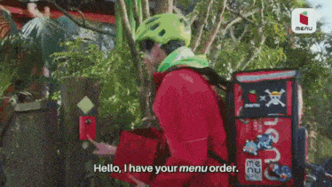 a man wearing a green helmet and a red jacket says hello i have your menu order ..