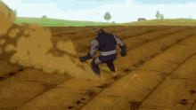 a man in a superhero costume is running through a field of dirt .