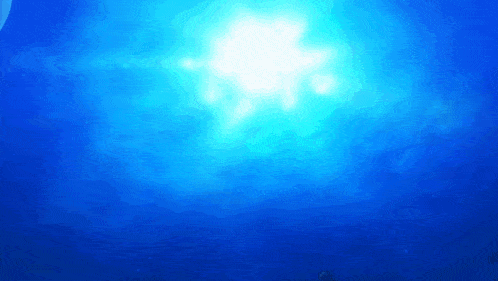 the sun shines brightly through the clouds in the ocean