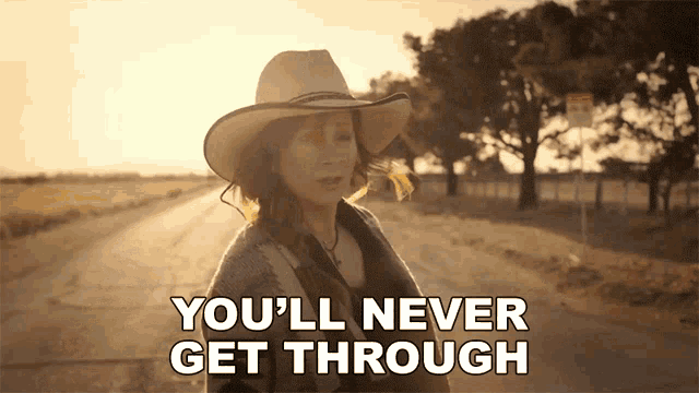 Youll Never Get Through Reba Mcentire GIF - Youll Never Get Through Reba Mcentire Somehow You Do Song GIFs