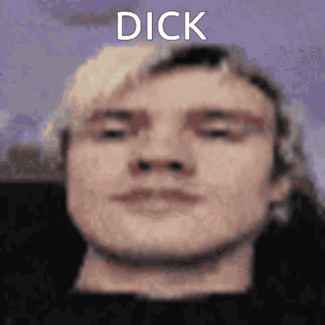 a close up of a man 's face with the word dick written above it