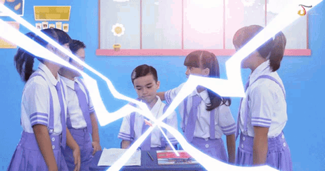 a group of children in purple uniforms are standing around a boy who is being bullied