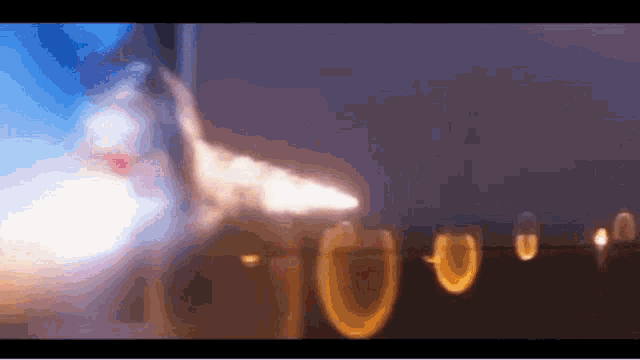 a blurred image of a plane with the number 10 visible