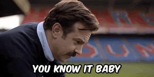 a man says " you know it baby " in front of a stadium