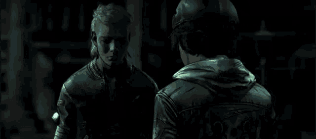 two men are hugging each other in a dark forest .