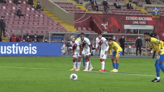 a group of soccer players on a field with a sign that says ustiveis