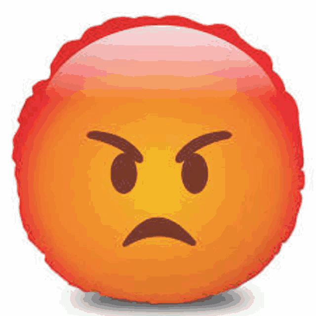 a round pillow with an angry smiley face on it