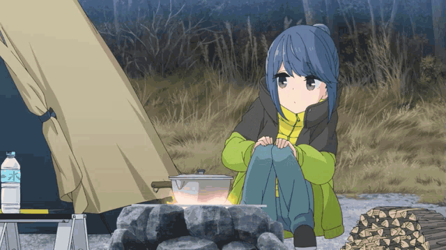 a girl sits in front of a campfire with a bottle of aquafina water in the foreground