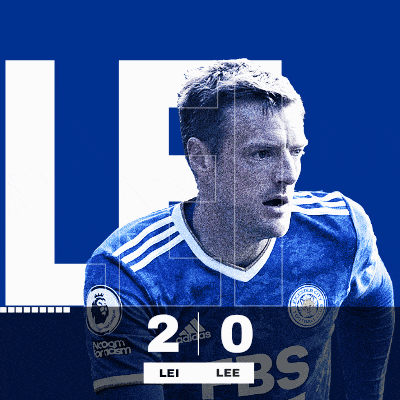 a soccer player in a blue jersey with the score of 2 to 0