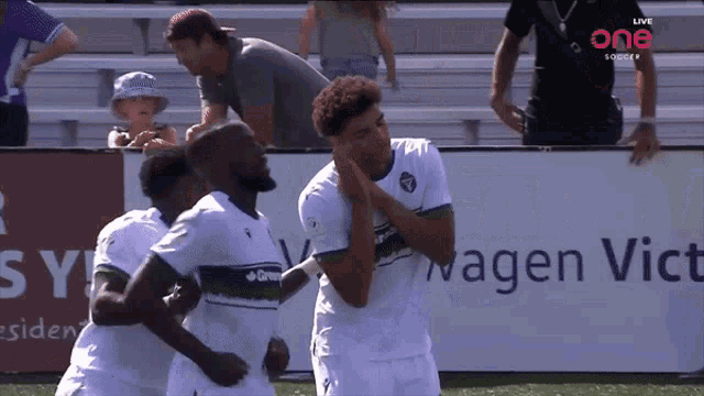a soccer game is being broadcast live on one