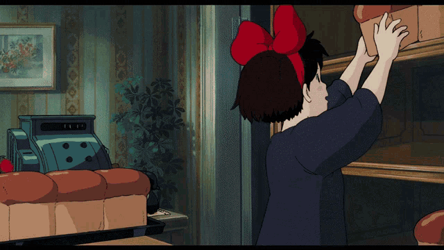 a cartoon of a girl with a red bow on her head